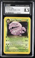 2000 Pokemon Team Rocket - 1st Ed. Dark Weezing #31/82 CGC 8.5